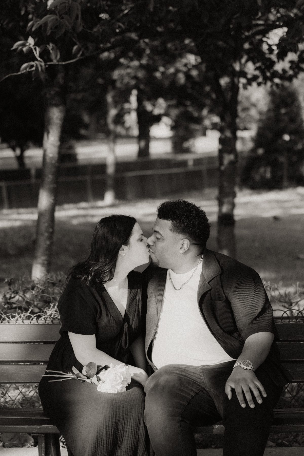 Black and white proposal couple portrait in Paris