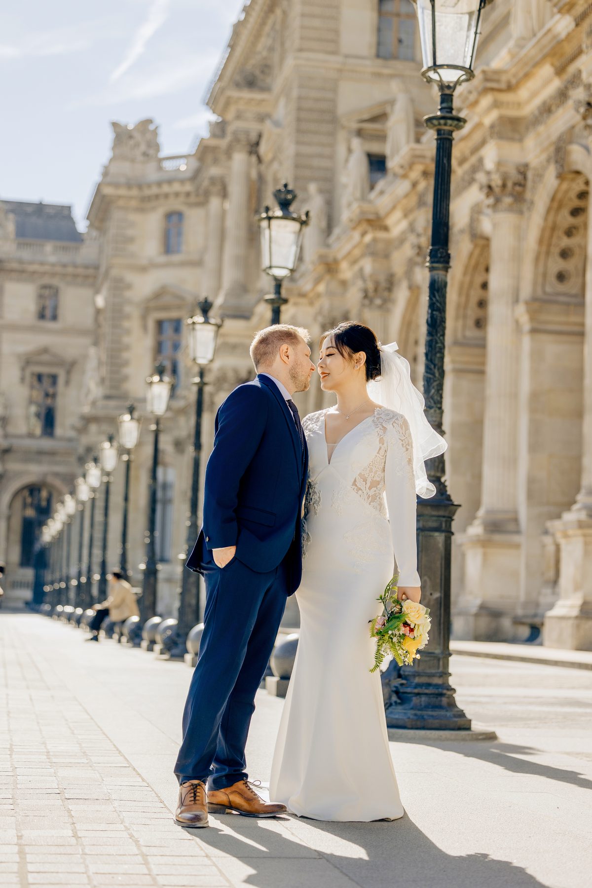 Romantic couple portrait at the Louvre